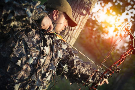 Modern Bow Hunter Stock Photo - 84394294